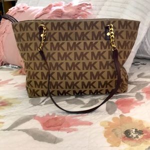 Michael Kors canvas purse.